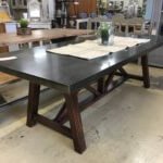 Vintage style dining table with a stunning metal top