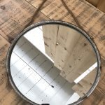 Round Metal Mirror Rope Hanger from arkvintage.com. Industrial style round mirror. It has a metal frame with rope to hang on the wall. Classic rustic look, a real eye catcher! shop buy online vintage camberley surrey