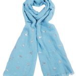 Scarf Humming Bird at arkvintage. A light blue scarf with a silver hummingbird foil print. A beautiful delicate design that accentuates any outfit. SHOP BUY ONLINE IN STORE CAMBERLEY SURREY