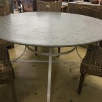 Round metal table, galvanised top.