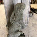 Stone Rabbit beautifully made from stone for us in a small artisan workshop in Devon. Perfect fro the garden or indoors. garden stone statuary