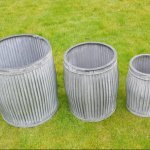 Galvanised Metal Planter Tubs free P&P Shop And Buy Now Online Metal Planter Tubs for garden camberley surrey online in store vintage from arkvintage. Classic ribbed planters in galvanised metal. Fabulous vintage look for your garden trees, plants or herbs etc. Available online now in 3 sizes