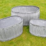 Galvanised Metal Planter Tubs free p&p Oval Now Online from arkvintage. Classic ribbed planters in galvanised metal. Fabulous vintage look for your garden trees, plants or herbs etc. Available online now in 3 sizes. vintage dolly tubs arkvintage camberley surrey buy shop online P&P