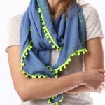 Scarf Blue With Pom Poms Two Colour Ways. The ever popular navy blue scarf with neon pink or yellow pom poms. This one is beautiful with a sense of fun and oozing style! shop buy online in store camberley surrey