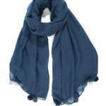 Scarf With Pom Poms msh at arkvintage. A beautifully designed scarf. It comes in 2 colours, navy blue and dark grey with pom poms at each end. Shop and buy online or in store, Camberley Surrey.