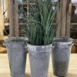 Metal Florist Pots, from Arkvintage. Beautifully made, with a classic tapered design. They have an aged patina, giving a unique finish to each one. arkvintage rust resistant